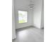 Bright and airy with modern lighting, this room provides a blank canvas for your imagination at 13406 Chenille Dr, Port Charlotte, FL 33981