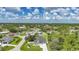 Aerial view of a home in a lush neighborhood showcasing its location and surroundings at 1523 Napoleon Rd, North Port, FL 34288