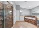 Bathroom features a walk-in shower, soaking tub, and tile flooring at 1523 Napoleon Rd, North Port, FL 34288