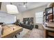 Well-organized office with a large desk, comfortable seating, and a whiteboard at 15261 Mille Fiore Blvd, Port Charlotte, FL 33953