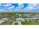Scenic aerial view highlighting the home's waterfront location, mature landscaping, and neighborhood surroundings at 15652 Havana Cir, Port Charlotte, FL 33981
