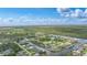 Stunning aerial view of a waterfront community with access to the Gulf of Mexico with beautiful vistas and landscaping at 15652 Havana Cir, Port Charlotte, FL 33981