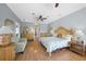Spacious main bedroom with wood floors, dresser, and comfortable furniture at 15652 Havana Cir, Port Charlotte, FL 33981