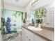 Bathroom featuring a sink, vanity, toilet, and shower with a zen inspired shower curtain at 167 & 169 Marker Rd, Rotonda West, FL 33947