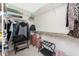 Walk-in closet featuring ample storage space with shelving, hanging rods, and space for luggage at 167 & 169 Marker Rd, Rotonda West, FL 33947