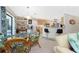 Dining area featuring a glass table and tropical-themed décor, connecting to the kitchen at 167 & 169 Marker Rd, Rotonda West, FL 33947