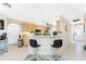 Kitchen with breakfast bar and stainless steel appliances at 167 & 169 Marker Rd, Rotonda West, FL 33947
