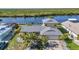 A beautiful waterfront home with a lush yard and easy access to the water at 18566 Arapahoe Cir, Port Charlotte, FL 33948