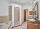 Spacious bathroom boasting a large double vanity and walk-in shower at 18566 Arapahoe Cir, Port Charlotte, FL 33948