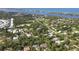 High angle shot of neighborhood showcasing lush greenery, waterways, and a well-planned community at 2131 Heasley Rd, Englewood, FL 34223
