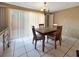 Dining room with tile flooring and lots of natural light at 2131 Heasley Rd, Englewood, FL 34223