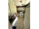 Small kitchen featuring white appliances, ample cabinet space, and a retro patterned floor at 2174 Schwalbe Way, Sarasota, FL 34235