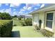Backyard patio with view of adjacent homes at 2244 Mauritania Rd, Punta Gorda, FL 33983