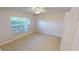 Bedroom features a large window with blinds and a closet for storage at 2244 Mauritania Rd, Punta Gorda, FL 33983