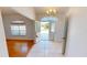 Bright foyer with tile flooring, high ceilings, and an open view of the front yard at 2244 Mauritania Rd, Punta Gorda, FL 33983