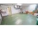 Open garage with an attached storage area at 2244 Mauritania Rd, Punta Gorda, FL 33983