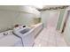 Convenient laundry room with modern appliances, cabinets and countertop space at 2244 Mauritania Rd, Punta Gorda, FL 33983