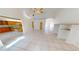 Bright living room with tiled flooring, high ceilings, and modern fixtures at 2244 Mauritania Rd, Punta Gorda, FL 33983