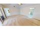 Carpeted main bedroom featuring ensuite bathroom and closet at 2244 Mauritania Rd, Punta Gorda, FL 33983