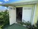 Rear door to storage area with a view of the contents at 2244 Mauritania Rd, Punta Gorda, FL 33983