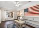 Cozy living room with hardwood floors and lots of natural light at 2373 Chartwell Ave, North Port, FL 34288