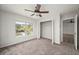 This cozy bedroom has a closet and large window with an outside view at 24261 Captain Kidd Blvd, Punta Gorda, FL 33955