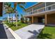 Charming coastal home with lush landscaping, a spacious covered patio, and convenient access to the private boat dock at 24261 Captain Kidd Blvd, Punta Gorda, FL 33955