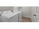 Bright laundry room with modern washer and dryer at 24261 Captain Kidd Blvd, Punta Gorda, FL 33955