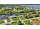 Stunning aerial view of waterfront homes with lush landscaping and canal access at 2467 Herron Ter, Port Charlotte, FL 33981