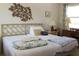Bedroom featuring two beds, side table, and decorative wall art at 2467 Herron Ter, Port Charlotte, FL 33981