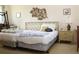 Bedroom featuring two beds, side table, and decorative wall art at 2467 Herron Ter, Port Charlotte, FL 33981