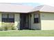 Charming single-story home featuring a well-maintained lawn and inviting front entrance at 2467 Herron Ter, Port Charlotte, FL 33981
