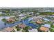 Expansive aerial view showcases waterfront living with multiple canals and stunning residential architecture at 250 Freeport Ct, Punta Gorda, FL 33950