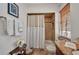 Bathroom featuring a shower-tub combo with stylish tile and a vanity with granite counters at 250 Freeport Ct, Punta Gorda, FL 33950