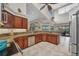 Bright kitchen with granite counters, stainless steel appliances, and ample cabinet space at 250 Freeport Ct, Punta Gorda, FL 33950