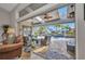 Lanai with view of pool and water feature, offering outdoor relaxation and entertaining space at 250 Freeport Ct, Punta Gorda, FL 33950