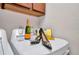 Laundry room setup, styled with champagne and shoes on the dryer at 250 Freeport Ct, Punta Gorda, FL 33950