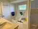 Bathroom with tub and shower featuring white fixtures at 26312 Deep Creek Blvd, Punta Gorda, FL 33983