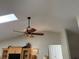 High ceiling and ceiling fan highlight the living room at 26312 Deep Creek Blvd, Punta Gorda, FL 33983