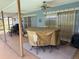 Covered patio with ceiling fans at 26312 Deep Creek Blvd, Punta Gorda, FL 33983