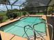 Screened in pool with a patio at 26312 Deep Creek Blvd, Punta Gorda, FL 33983