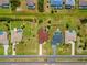 Birds eye view of residential neighborhood with houses that have backyard swimming pools at 264 Rotonda N Blvd, Rotonda West, FL 33947