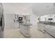 Bright kitchen with a center island, stainless steel appliances, and plenty of counter space at 264 Rotonda N Blvd, Rotonda West, FL 33947