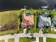 Aerial view of a single Gathering waterfront home with pool and dock at 3322 Sandpiper Dr, Punta Gorda, FL 33950
