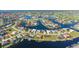 Aerial view of waterfront homes in a beautiful community with many canals at 3322 Sandpiper Dr, Punta Gorda, FL 33950