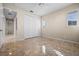 Neutral bedroom features a closet, tile floors and windows with white shutters at 3322 Sandpiper Dr, Punta Gorda, FL 33950