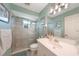 Well-lit bathroom with a glass-enclosed shower and updated fixtures at 37 Pepe Ct, Punta Gorda, FL 33983