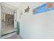 Inviting entryway featuring a cheerful 'Welcome to Paradise' sign and view into the home's interior at 37 Pepe Ct, Punta Gorda, FL 33983