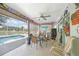 Covered lanai featuring outdoor seating and a view of the pool at 37 Pepe Ct, Punta Gorda, FL 33983