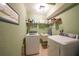 Laundry room equipped with modern washer and dryer at 37 Pepe Ct, Punta Gorda, FL 33983